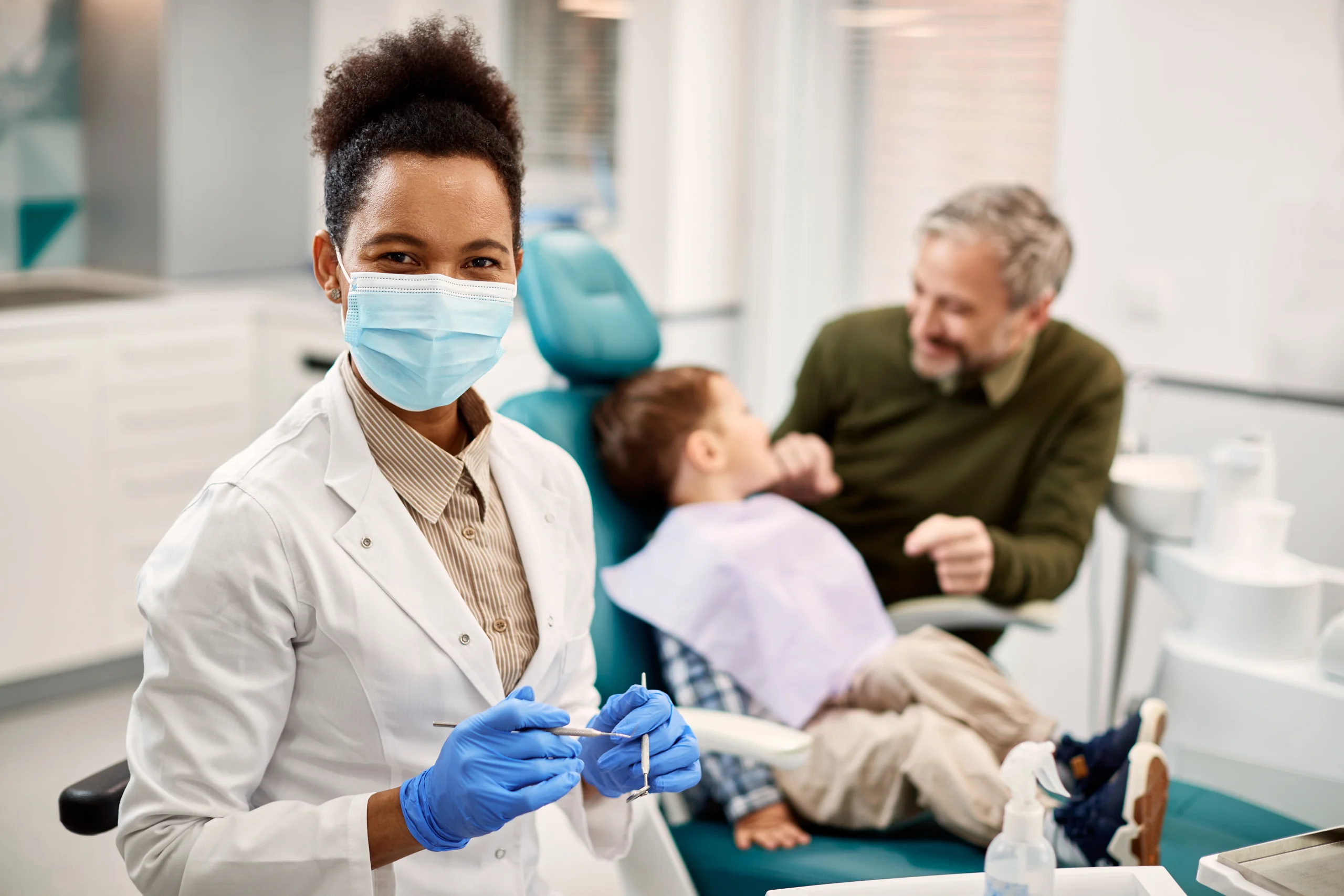 general dentistry dentist checking up on a kid