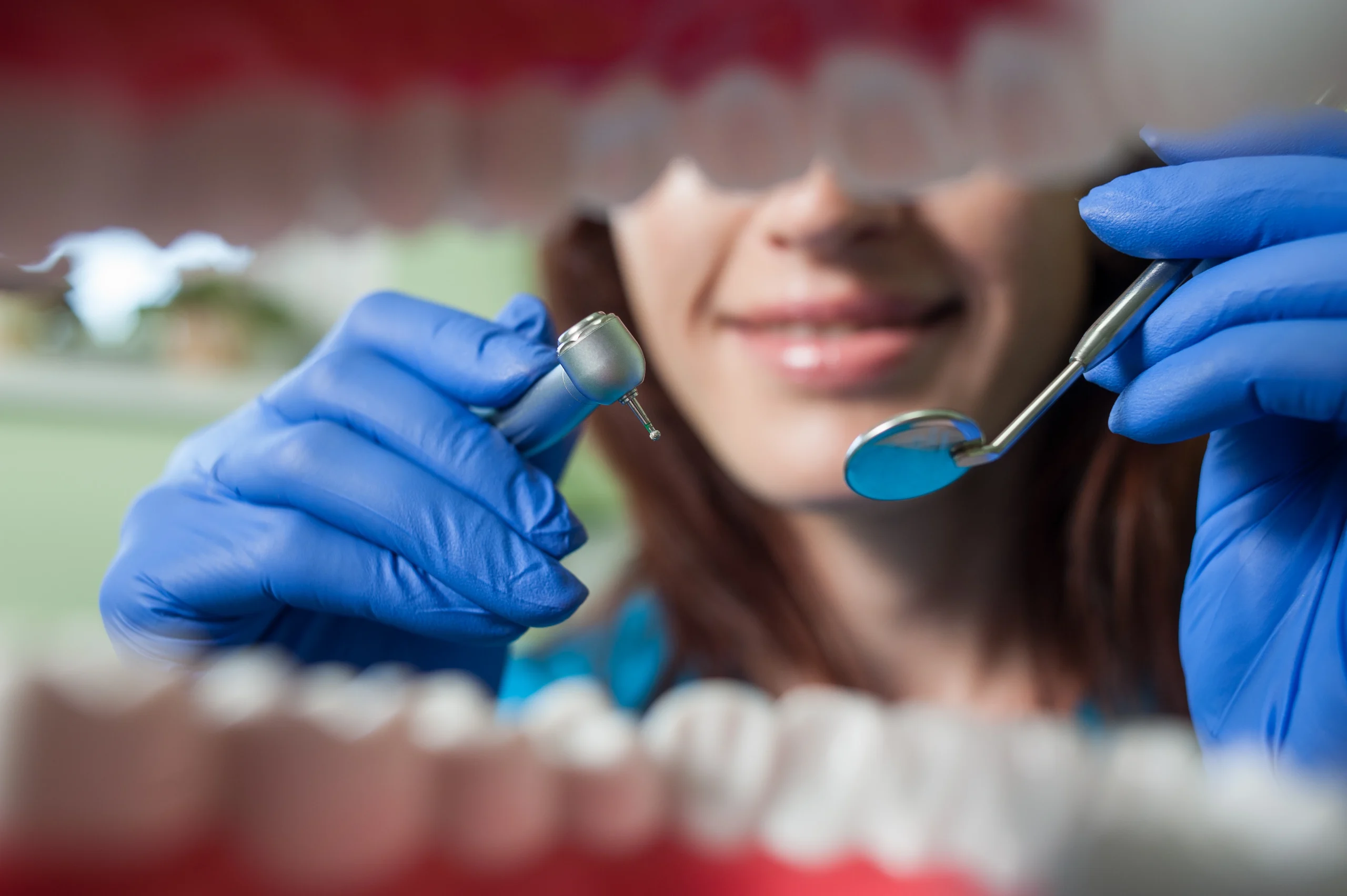 dentist checking in the teeth